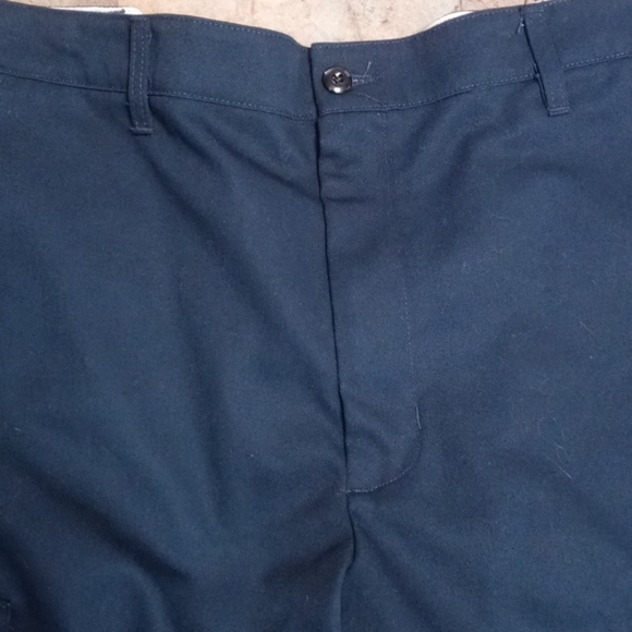 Red cap. Navy work pants - Picture 2 of 6